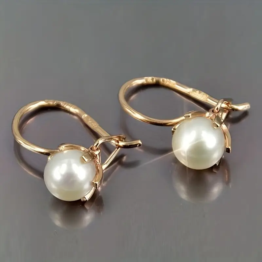 Elegante Goldperlenohrringe